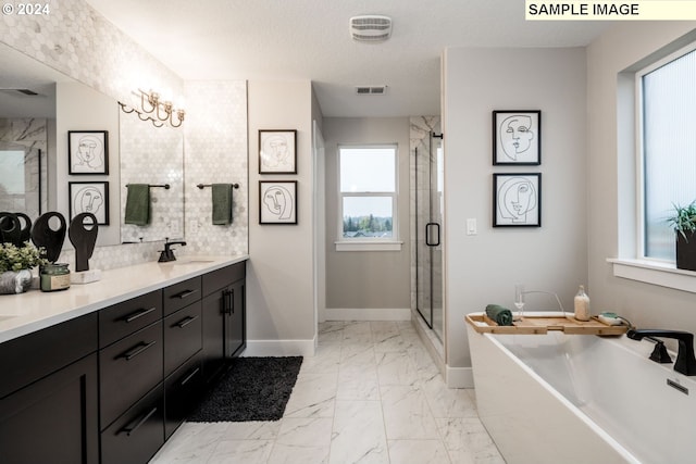 bathroom featuring tile patterned flooring, independent shower and bath, a textured ceiling, and vanity