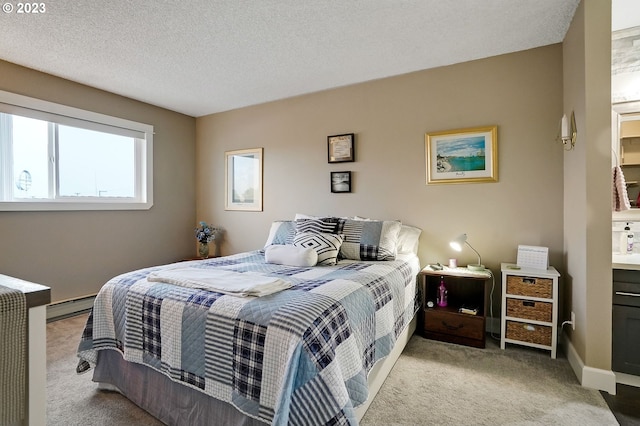 carpeted bedroom with a textured ceiling and a baseboard heating unit