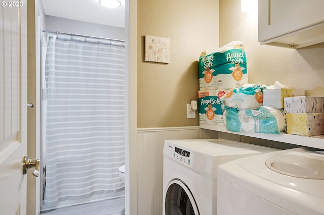 laundry room featuring washer and clothes dryer