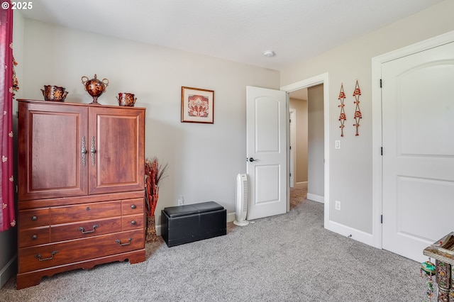 10703 NW Glenmore Way, Portland, OR 97229 - carpeted bedroom featuring baseboards