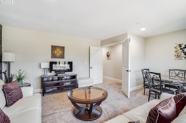 10703 NW Glenmore Way, Portland, OR 97229 - living room featuring light colored carpet and recessed lighting