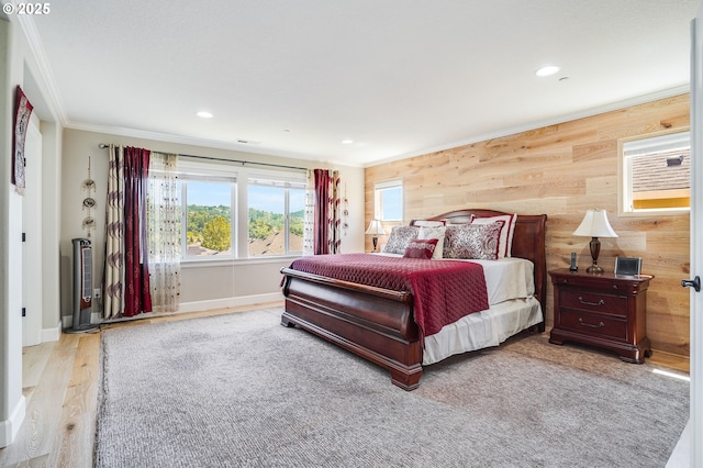 10703 NW Glenmore Way, Portland, OR 97229 - bedroom with crown molding, wood walls, wood finished floors, and recessed lighting