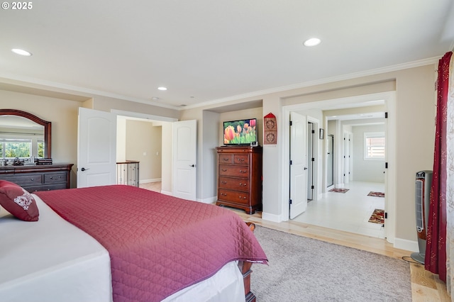 10703 NW Glenmore Way, Portland, OR 97229 - bedroom featuring multiple windows, ornamental molding, recessed lighting, light wood-type flooring, and heating unit