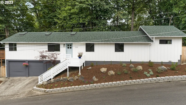 view of front of property featuring a garage