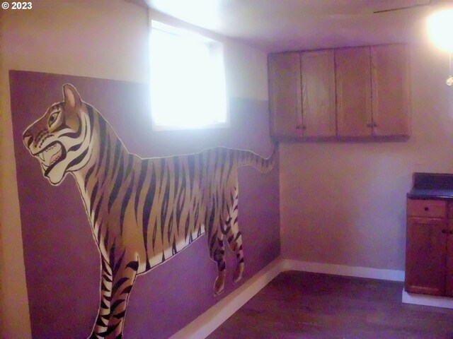 empty room featuring dark hardwood / wood-style flooring