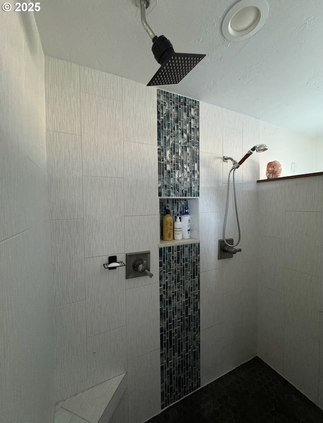 bathroom featuring tiled shower