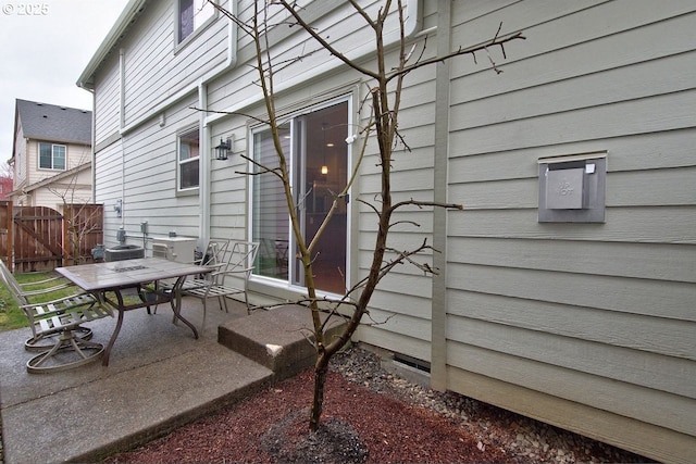 view of patio / terrace featuring a gate and fence