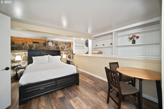 bedroom featuring dark hardwood / wood-style floors