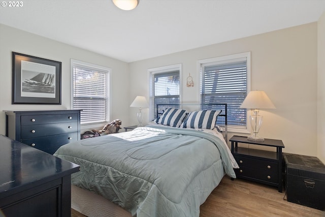 bedroom with light hardwood / wood-style floors