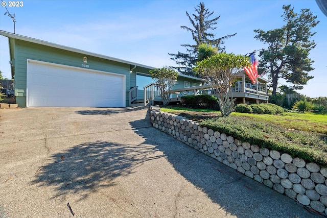 ranch-style house featuring a garage