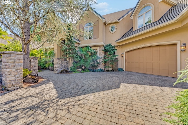 view of front of property featuring a garage