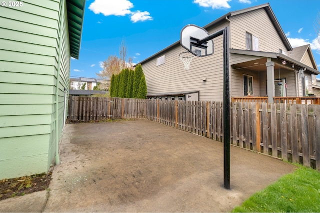 9450 SW Lehman St, Portland, OR 97223 - view of home's exterior with a patio area