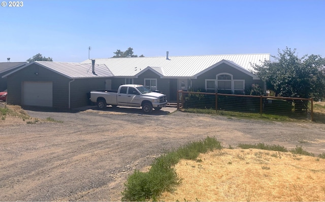 view of front of property with a garage