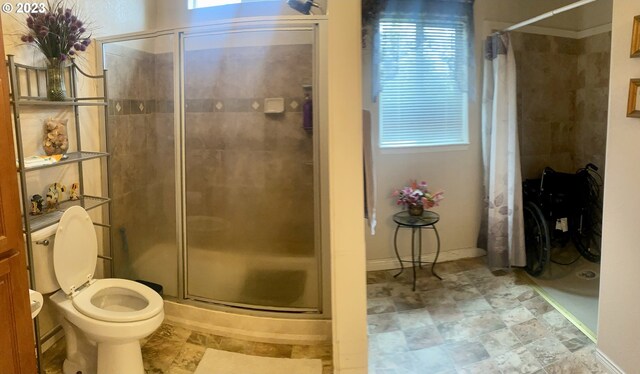 bathroom featuring walk in shower, toilet, and tile flooring