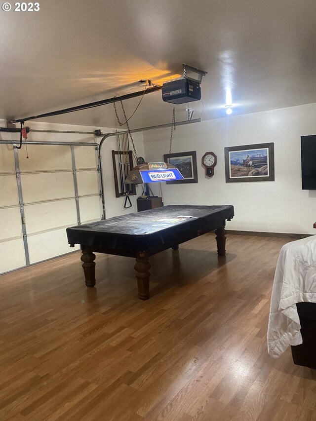 rec room with pool table and hardwood / wood-style flooring