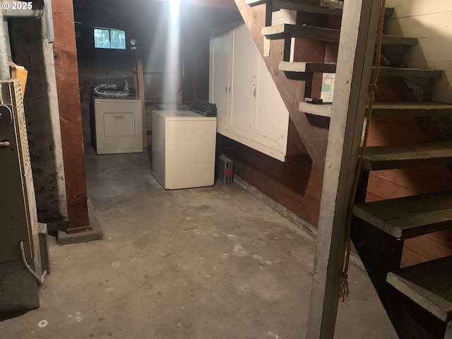 basement with washing machine and clothes dryer