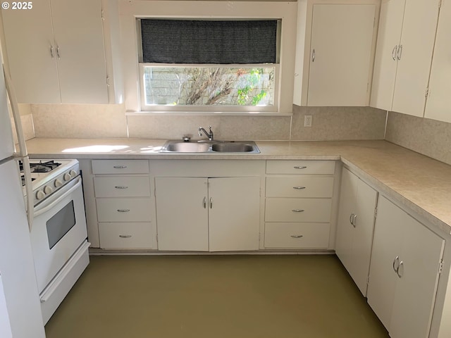 kitchen with tasteful backsplash, sink, white appliances, and white cabinets