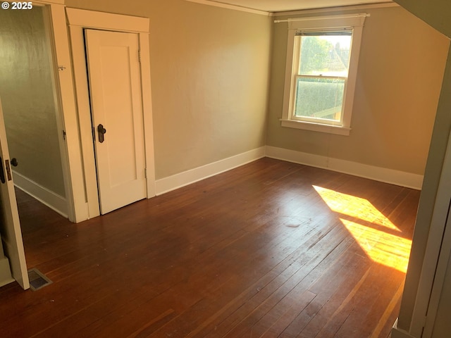 bonus room featuring dark hardwood / wood-style flooring