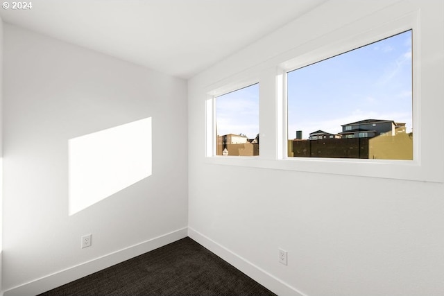 17007 NE 82nd St, Vancouver, WA 98682 - spare room featuring dark carpet and baseboards