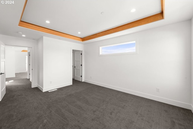 17007 NE 82nd St, Vancouver, WA 98682 - unfurnished bedroom featuring dark carpet, a raised ceiling, and baseboards