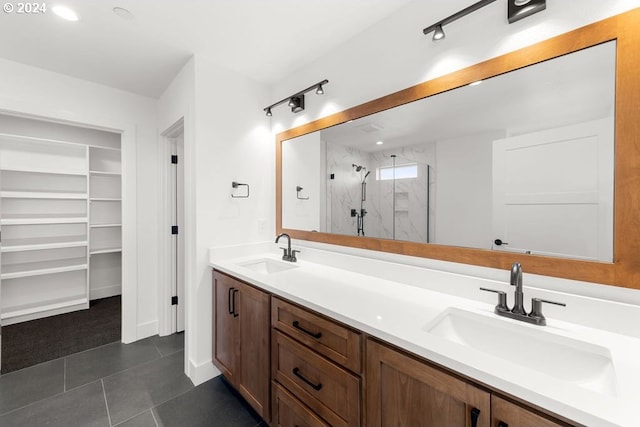 17007 NE 82nd St, Vancouver, WA 98682 - full bath with a marble finish shower, tile patterned floors, double vanity, and a sink