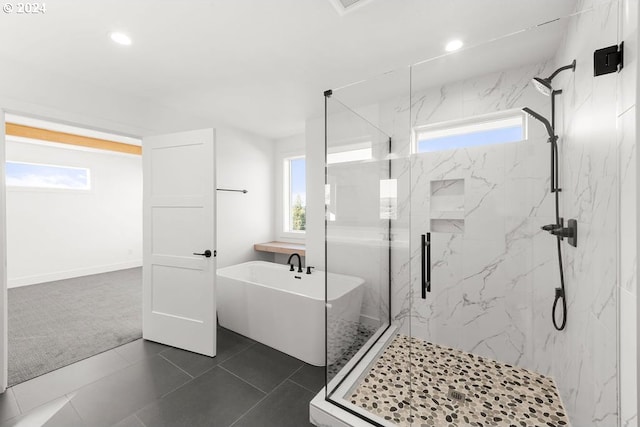 17007 NE 82nd St, Vancouver, WA 98682 - full bathroom with a marble finish shower, a soaking tub, a healthy amount of sunlight, and tile patterned flooring