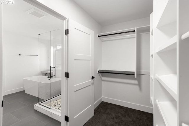 17007 NE 82nd St, Vancouver, WA 98682 - spacious closet featuring dark tile patterned floors and visible vents