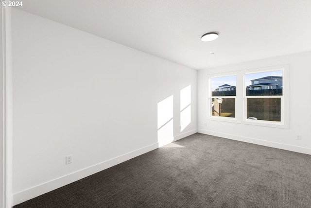 17007 NE 82nd St, Vancouver, WA 98682 - empty room featuring baseboards and dark colored carpet