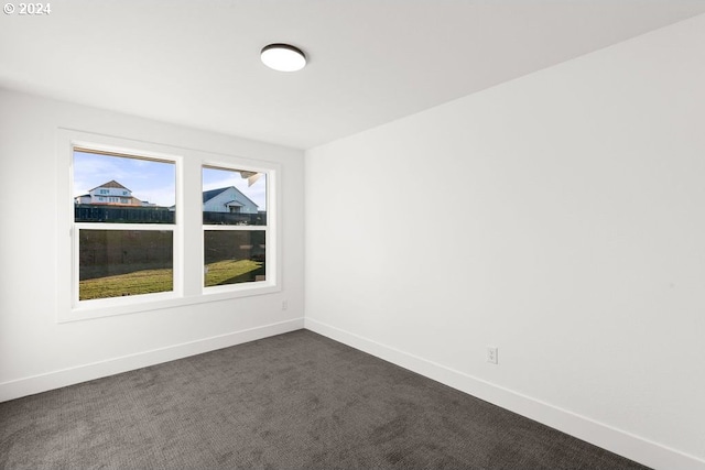 17007 NE 82nd St, Vancouver, WA 98682 - spare room featuring baseboards and dark colored carpet