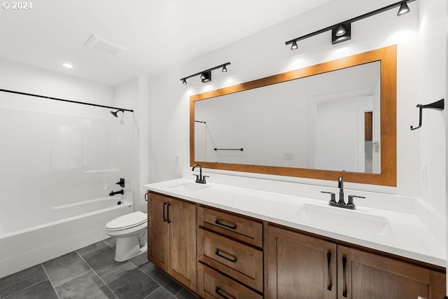 17007 NE 82nd St, Vancouver, WA 98682 - bathroom featuring double vanity, toilet, shower / bathing tub combination, and a sink