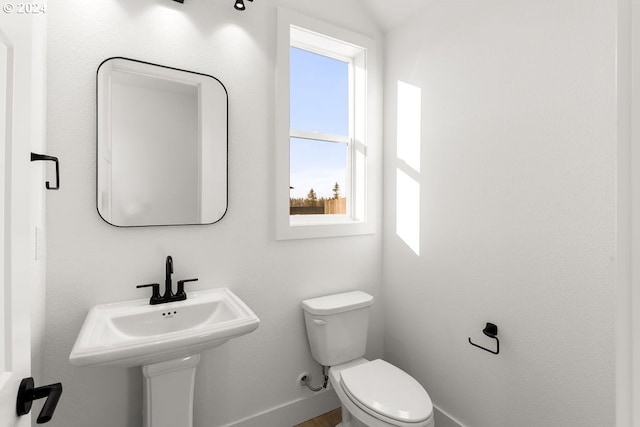 17007 NE 82nd St, Vancouver, WA 98682 - bathroom featuring baseboards and toilet