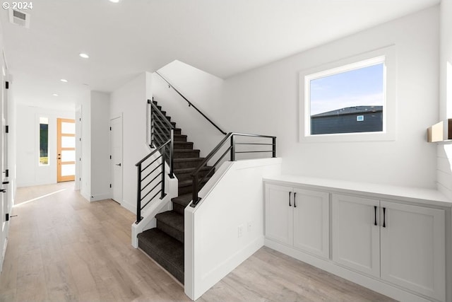 17007 NE 82nd St, Vancouver, WA 98682 - stairway with wood finished floors, visible vents, and a wealth of natural light