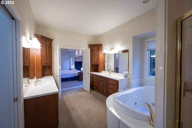 bathroom featuring vanity and a bathtub