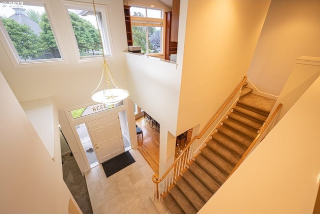 entryway featuring a high ceiling