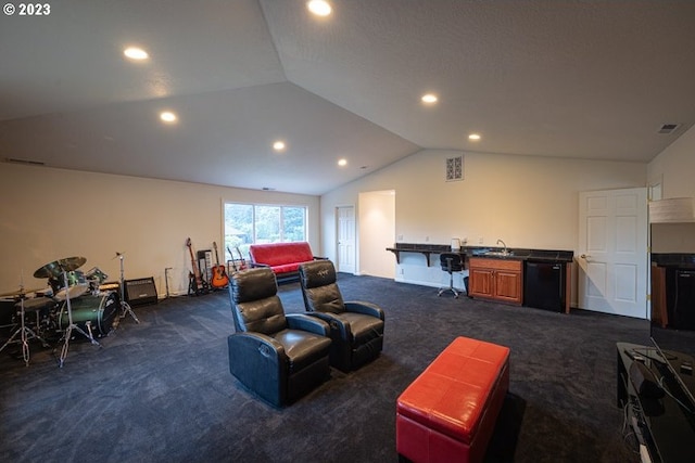 carpeted living room featuring sink and vaulted ceiling