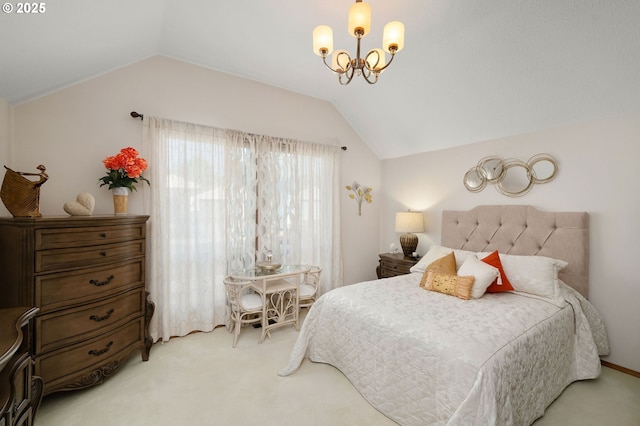 carpeted bedroom featuring a chandelier and lofted ceiling