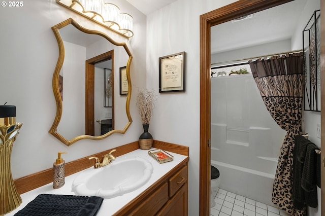 bathroom featuring vanity, tile patterned floors, and shower / bath combo
