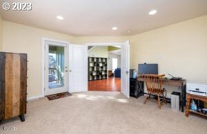 home office with carpet floors