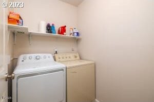 laundry area with washer and clothes dryer