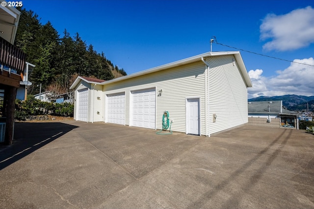 detached garage with a mountain view