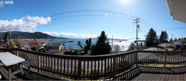 wooden terrace featuring a mountain view