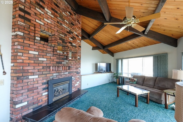 carpeted living area featuring lofted ceiling with beams, wood ceiling, a brick fireplace, and ceiling fan