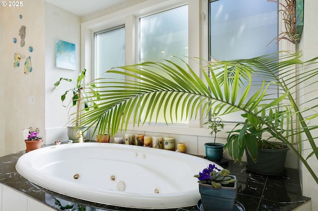 bathroom featuring a whirlpool tub