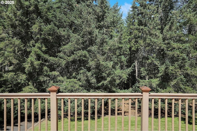 deck featuring a lawn