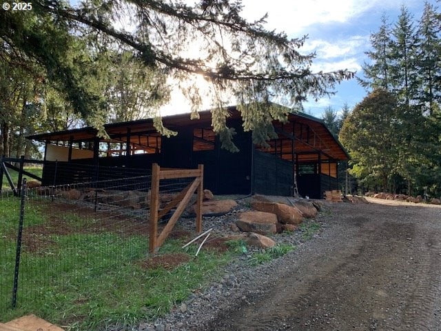 view of outbuilding featuring an outdoor structure and an exterior structure