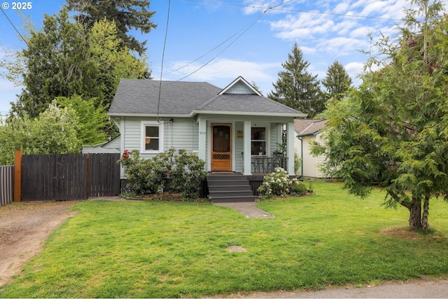 5414 NE 47th Ave, Portland, OR 97218 - bungalow-style home with a porch, fence, a shingled roof, and a front yard