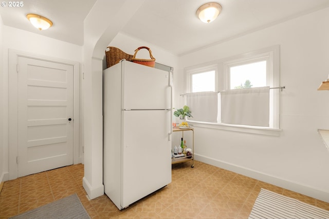 5414 NE 47th Ave, Portland, OR 97218 - kitchen with baseboards and freestanding refrigerator