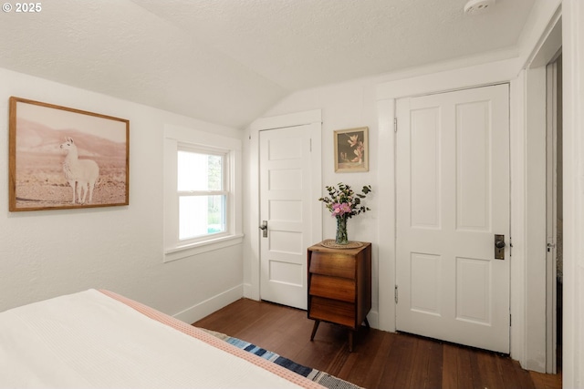 5414 NE 47th Ave, Portland, OR 97218 - bedroom featuring baseboards, vaulted ceiling, and dark wood-style floors