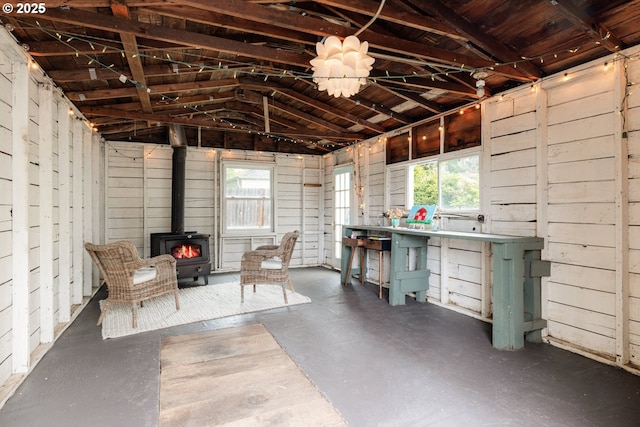 5414 NE 47th Ave, Portland, OR 97218 - interior space with a wood stove and lofted ceiling