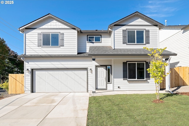 888 S 9th St, Harrisburg, OR 97446 - view of front facade featuring a garage, driveway, and a shingled roof